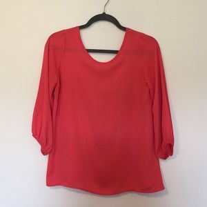 Pink top with bow detail on back